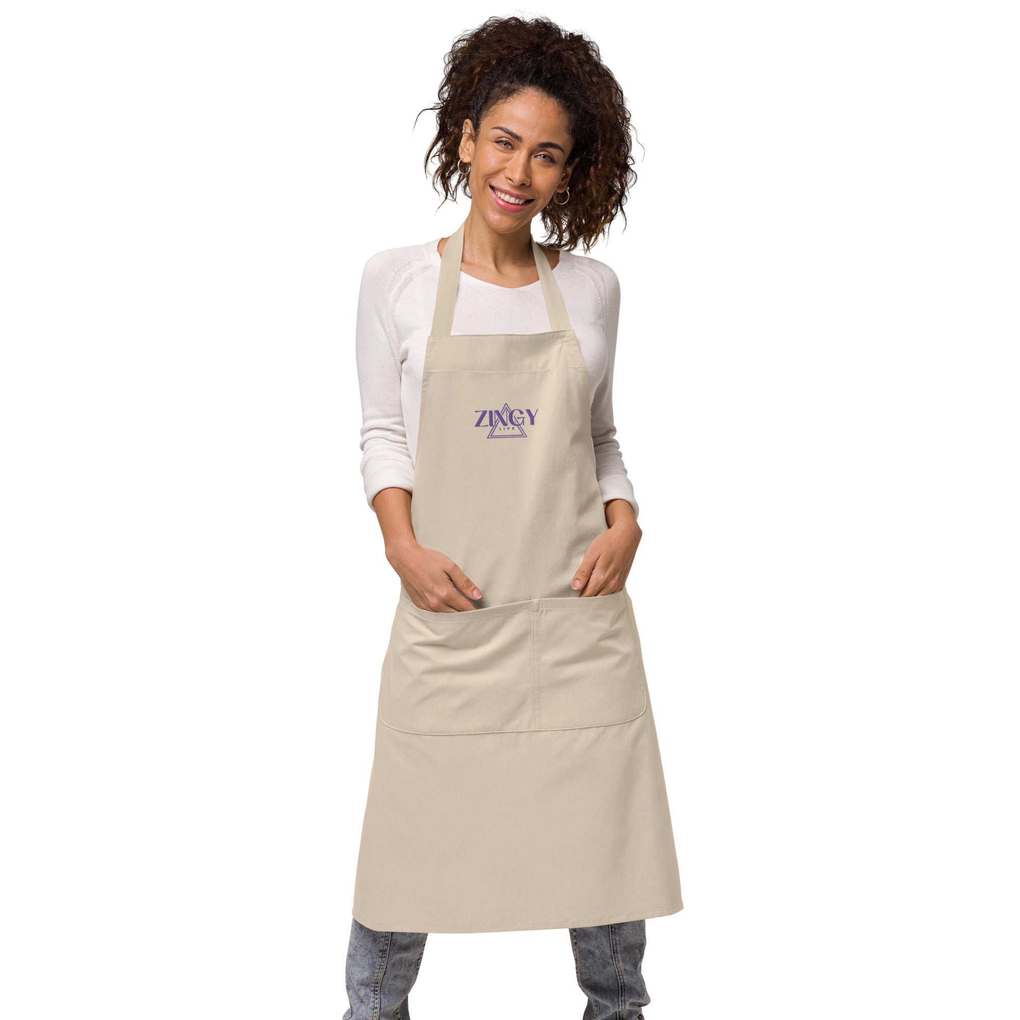 Front view of organic cotton apron showing large front pocket with 2 compartments and sustainable cotton fabric