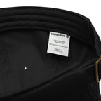 Close-up of organic dad hat fabric texture showing 100% organic cotton 3/1 twill construction